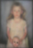 Little girl holding doll's head