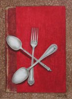 Saudade, cubiertos sobre libro